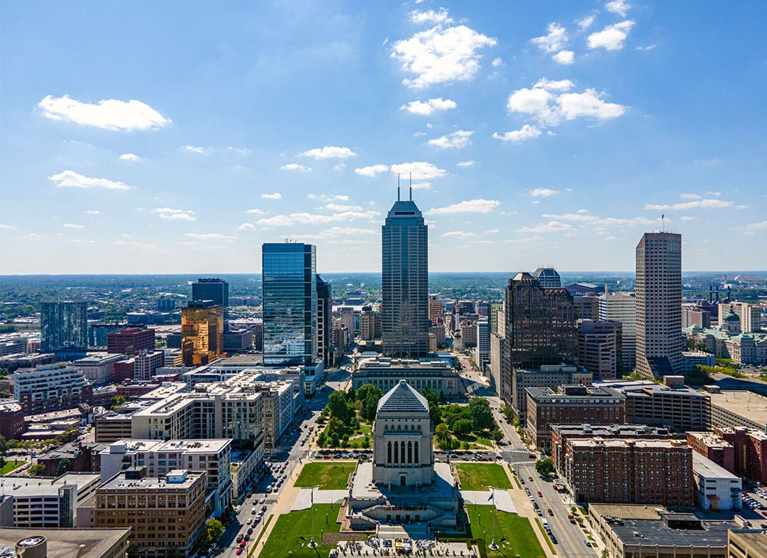 Indianapolis, IN - Sunny View of Indianapolis Downtown Skyline With Clouds in the Sky